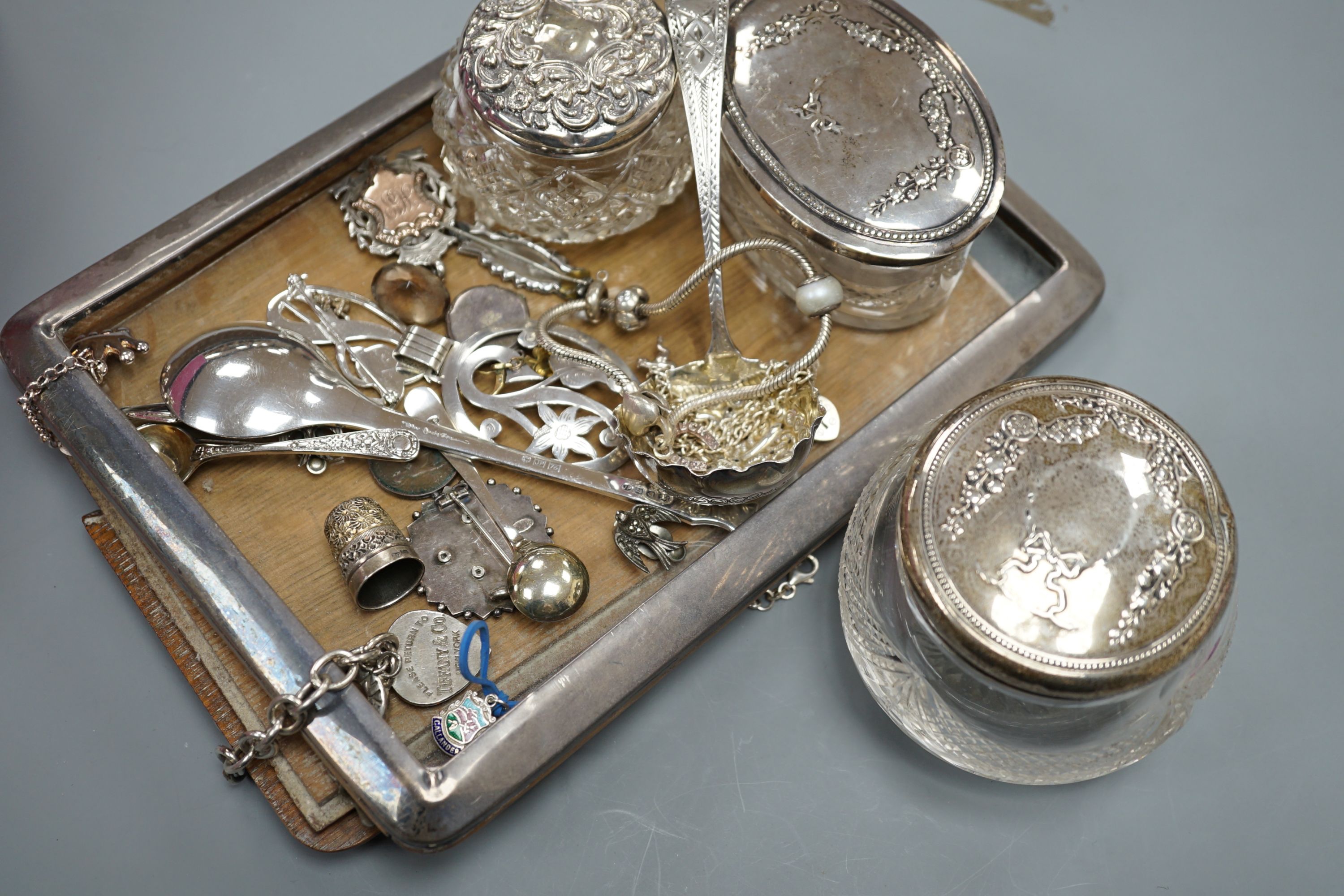Assorted small silver and white metal jewellery including silver mounted photograph frame, four toilet jars, sifter spoon, brooches, medallion etc.
